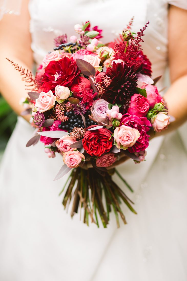 Red and pink floral bouquet for wedding
