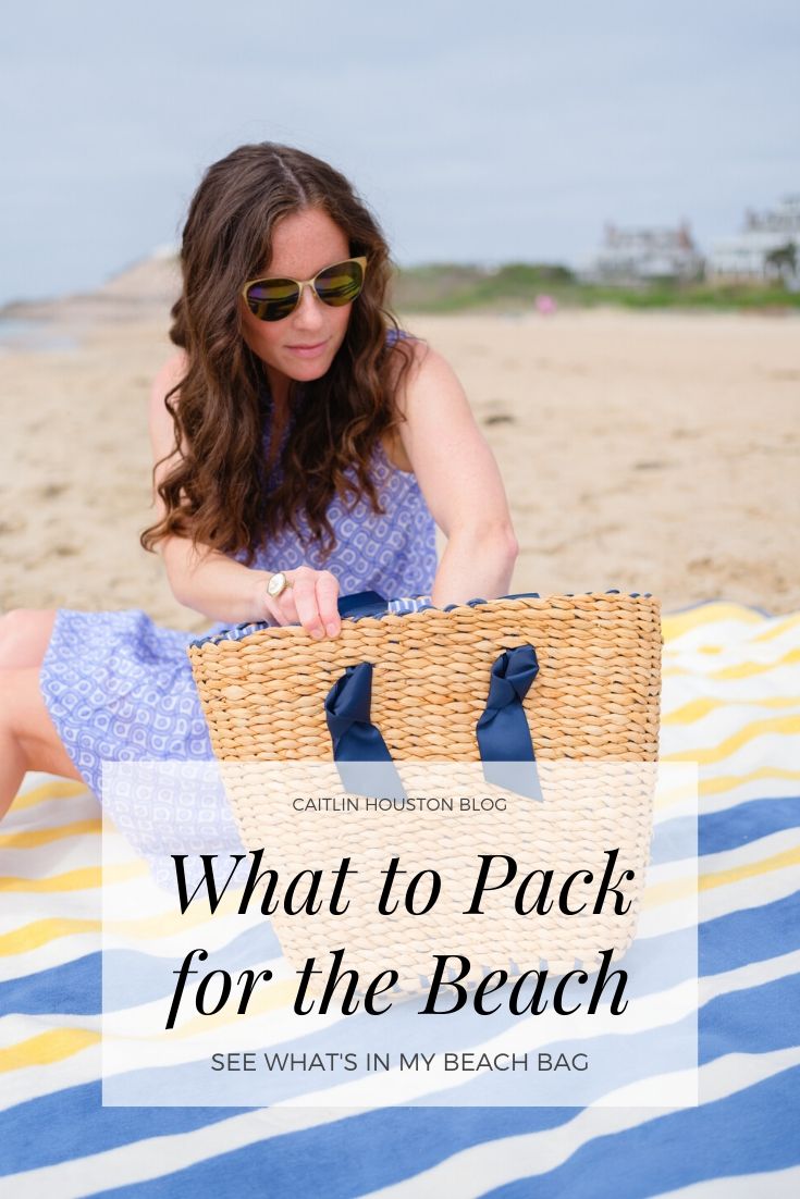 girl packing beach bag 