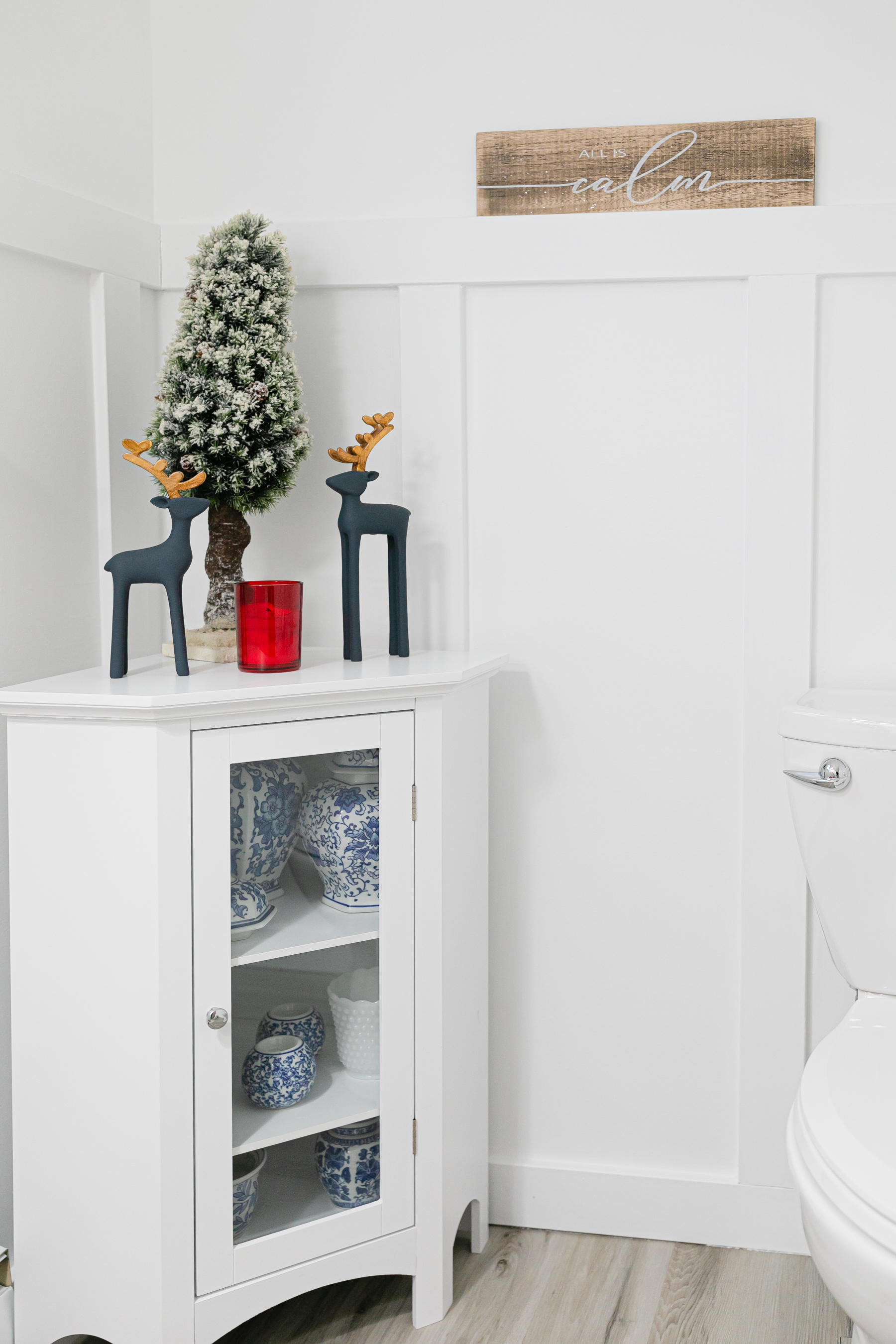 bathroom corner cabinet decorated for christmas