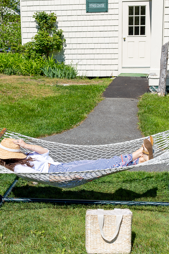 woman relaxing in hammock