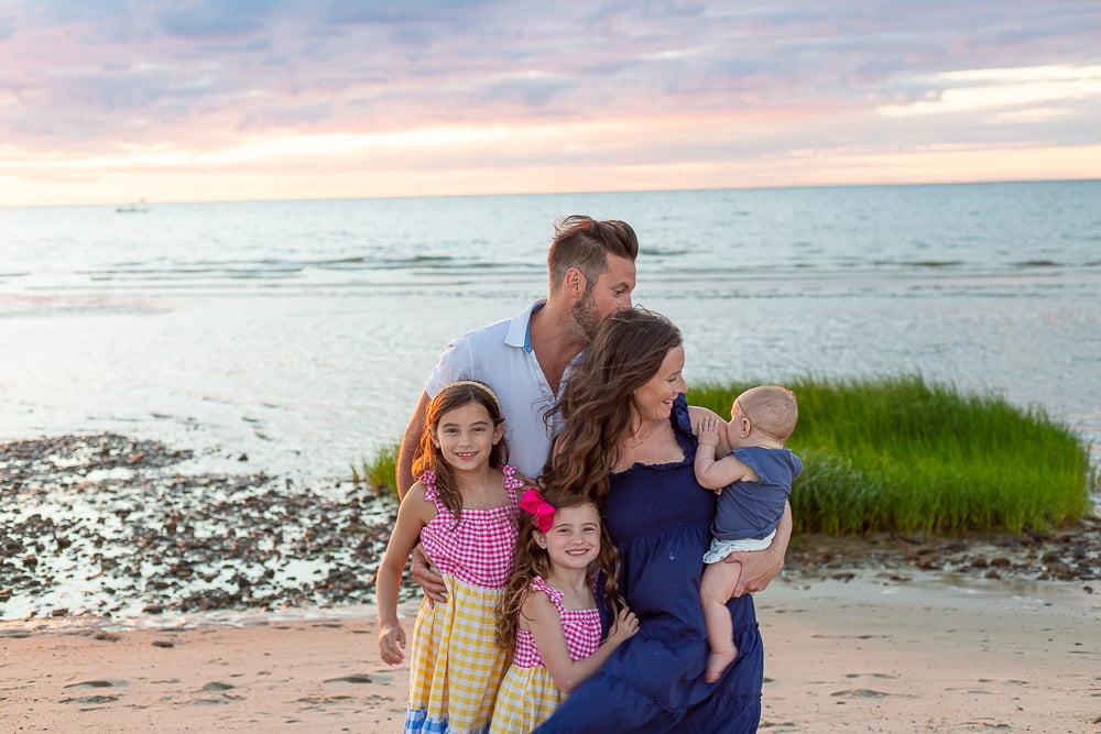 Family on Beach During Sunset Ocean Edge Resort