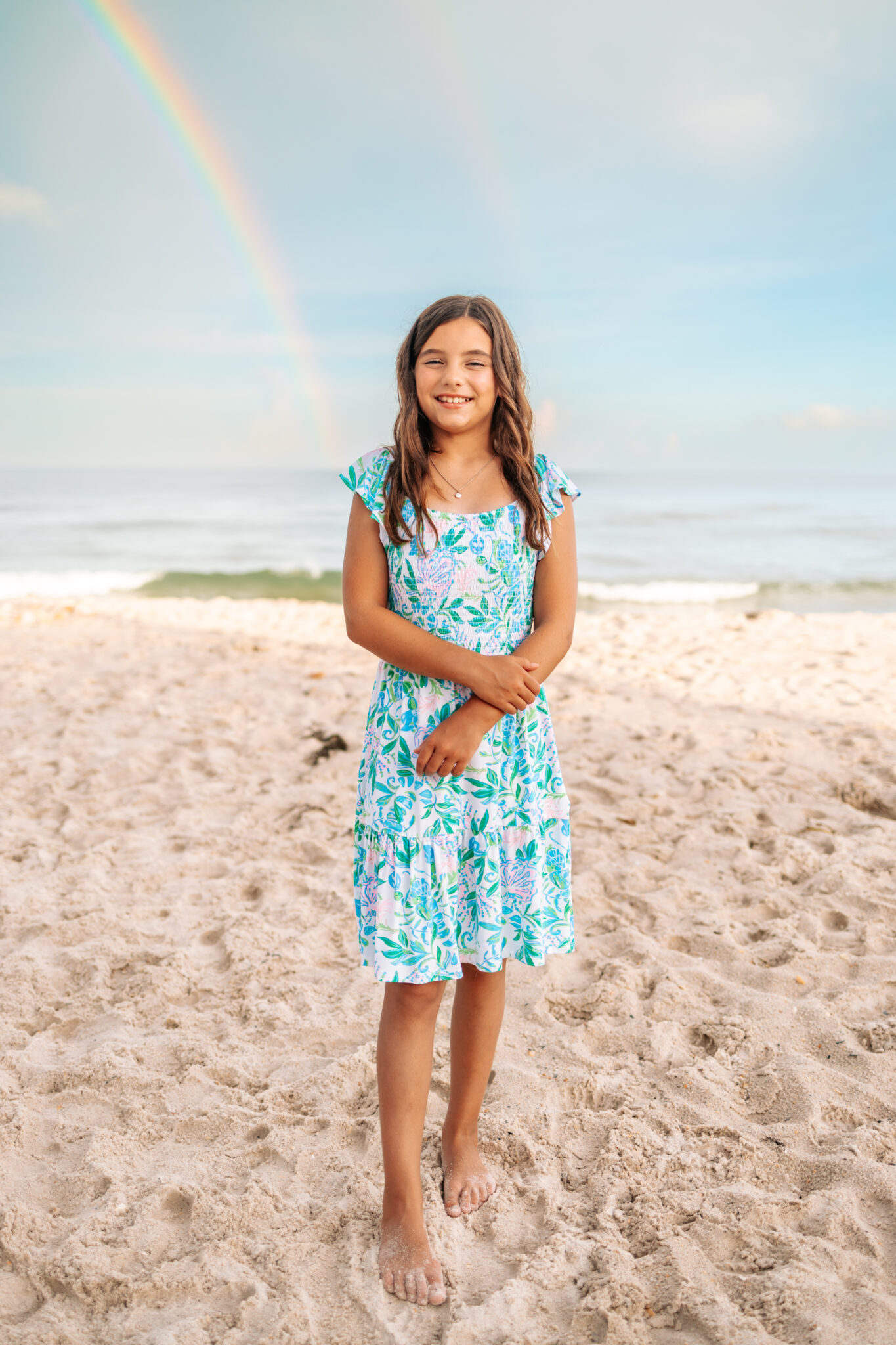 full length portrait of child on beach in lilly pulitzer